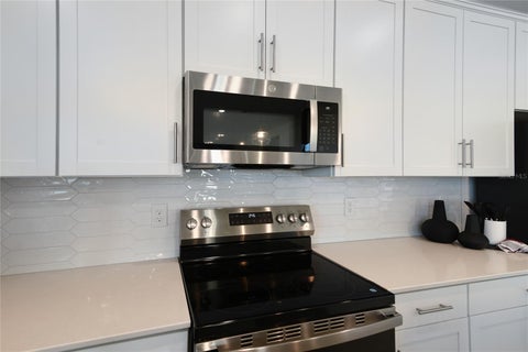 Tiny photo for 10125 Turnberry Lane, Leesburg, FL 34788 (MLS # S5147394)