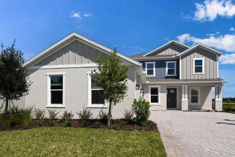 Photo of 853 Junonia Boulevard, New Smyrna Beach, FL 32168 (MLS # O6296718)