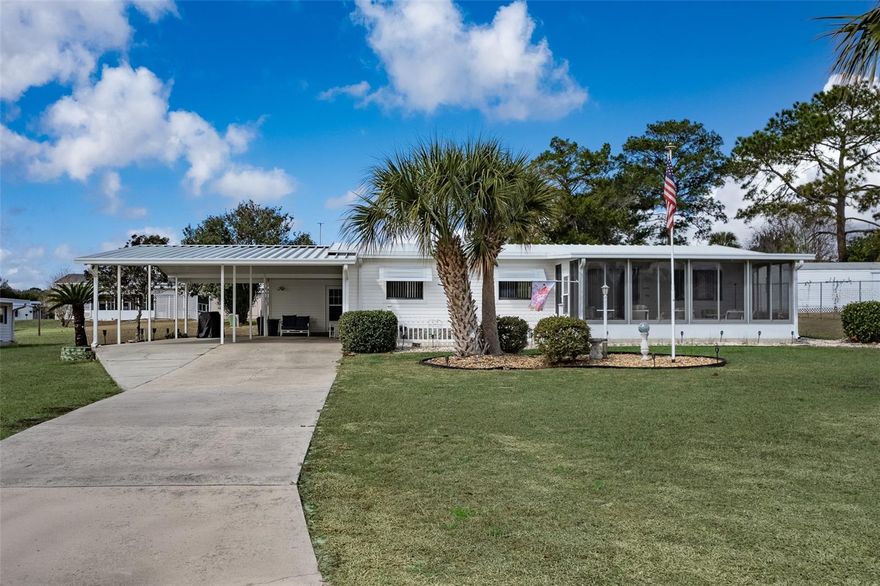 Located in Lake Weir Harbor Estates in Summerfield, this well-maintained 2-bedroom, 2 bath manufactured home with land offers comfortable living with plenty of space inside and out. The home features a bright living area, functional kitchen with ample cabinetry, and a spacious primary bedroom with walk-in closet. Enjoy Florida living year-round in the large, enclosed Florida room, perfect for relaxing or entertaining. Outside, the property includes a covered carport, extended driveway, and a detached garage/workshop, providing plenty of room for vehicles, tools, or hobbies. The home also offers a dedicated laundry area and additional enclosed porch space, giving flexibility for storage or extra living space.

Situated on its own land in a quiet neighborhood near Lake Weir, this property provides easy access to boating, fishing, and outdoor recreation while still being conveniently located near shopping, dining, and The Villages.

A great opportunity for full-time living, seasonal use, or investment.