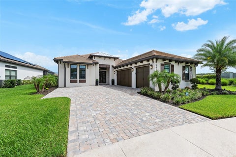 Photo of 34135 Tompion Way, Wesley Chapel, FL 33543 (MLS # TB8536816)