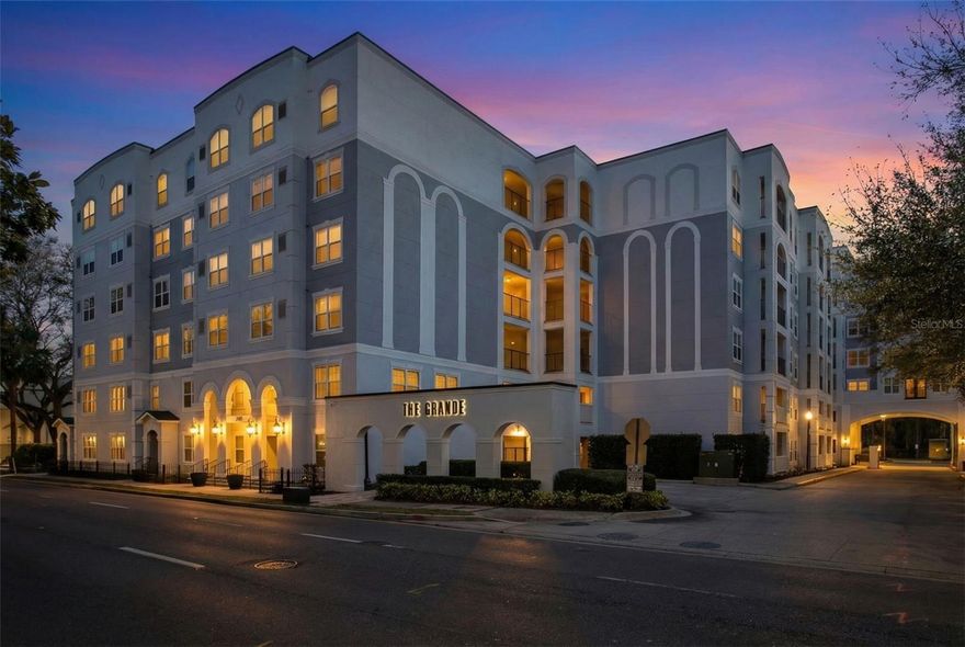 Welcome to 204 E SOUTH STREET, a meticulously maintained 2-BEDROOM, 2-BATHROOM condo offering OVER 1,100 square feet of stylish living in the heart of downtown Orlando. Situated on the 6TH FLOOR, this move-in ready residence features HARDWOOD FLOORING throughout, crown molding, and a REMODELED KITCHEN and BATHROOMS designed with both function and modern appeal in mind. The open layout flows seamlessly into the living space, where French doors lead out to a private balcony overlooking the RESORT-STYLE POOL and the DOWNTOWN SKYLINE—your own elevated retreat in the city. The spacious primary suite and well-appointed second bedroom provide comfort and flexibility, while the inclusion of a washer and dryer adds everyday convenience. This unit also stands out with THREE PARKING SPACES and two EXTERIOR STORAGE UNITS, a rare and valuable find in downtown living. Located in The Grande, you’ll enjoy a gated community with a tropical resort-style pool, multiple grilling areas, FITNESS CENTER, and a PET WALKING AREA. The HOA covers water, sewer, and trash, helping simplify your monthly expenses. Step outside and you’re in one of downtown Orlando’s most desirable pockets—just next to the Dr. Phillips Center for the Performing Arts, and only a couple blocks from Publix, Lake Eola, restaurants, and coffee shops. With quick access to I-4 and the 408, commuting and exploring the city couldn’t be easier. Downtown living, upgraded comfort, and a poolside view—this one truly checks all the boxes.