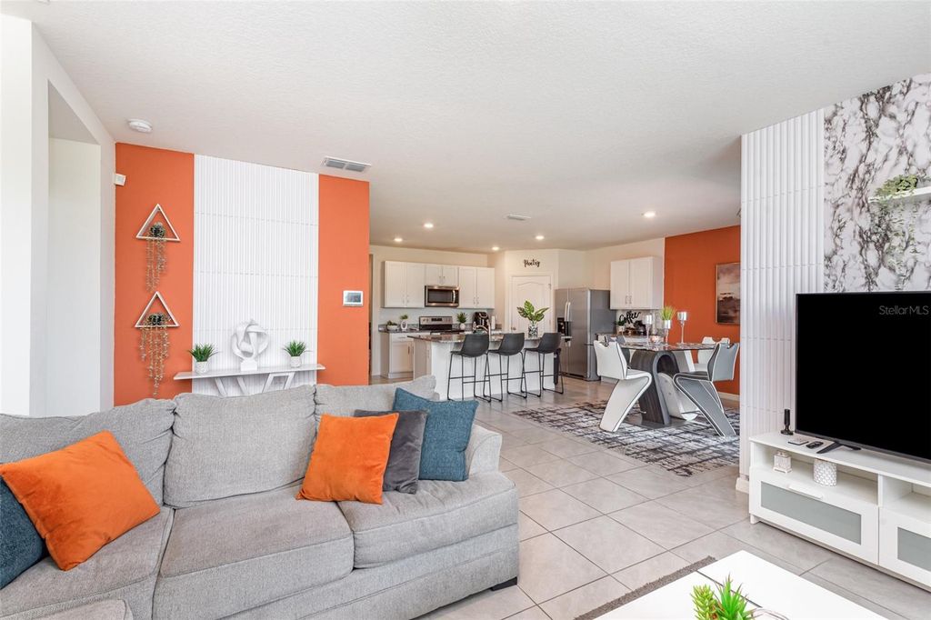 Photo of 1031 August Sky Drive, Deltona, FL 32738 (MLS # O6374857)