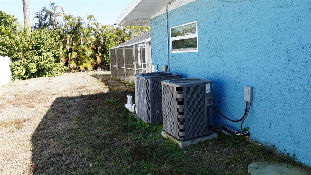 Photo of 3064 Pinetree Street, Port Charlotte, FL 33952 (MLS # O6385320)