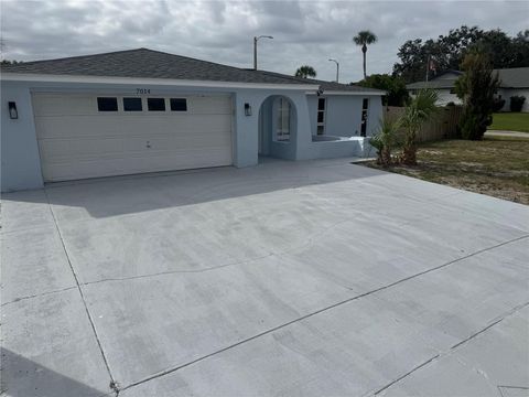 Photo of 7014 Ingleside Drive, Port Richey, FL 34668 (MLS # TB8437266) Photo of 7014 Ingleside Drive, Port Richey, FL 34668 (MLS # TB8437266)