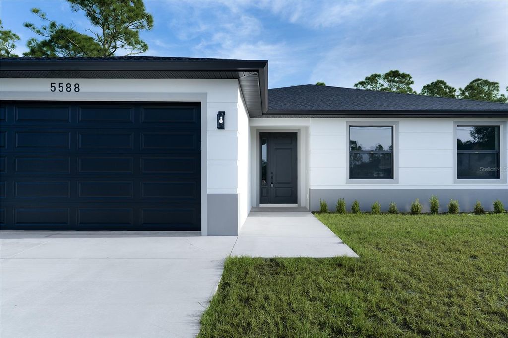 Photo of 5588 Douglas Road, North Port, FL 34288 (MLS # A4660662)