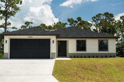 Photo of 5588 Douglas Road, North Port, FL 34288 (MLS # A4660662) Photo of 5588 Douglas Road, North Port, FL 34288 (MLS # A4660662)