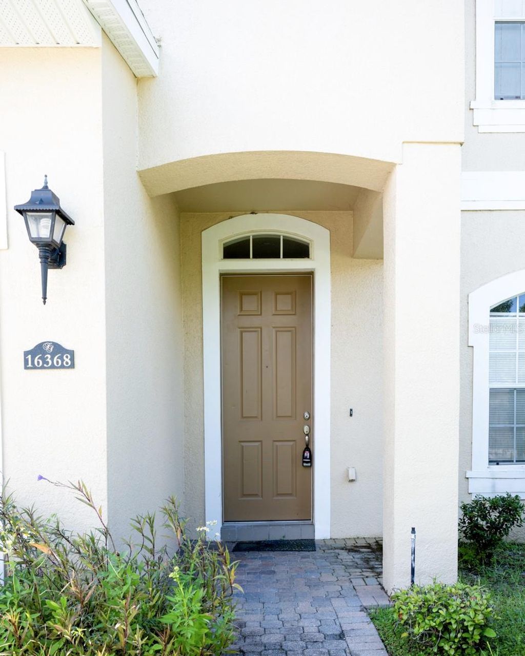 Photo of 16368 Tudor Grove Drive, Orlando, FL 32828 (MLS # O6349513)