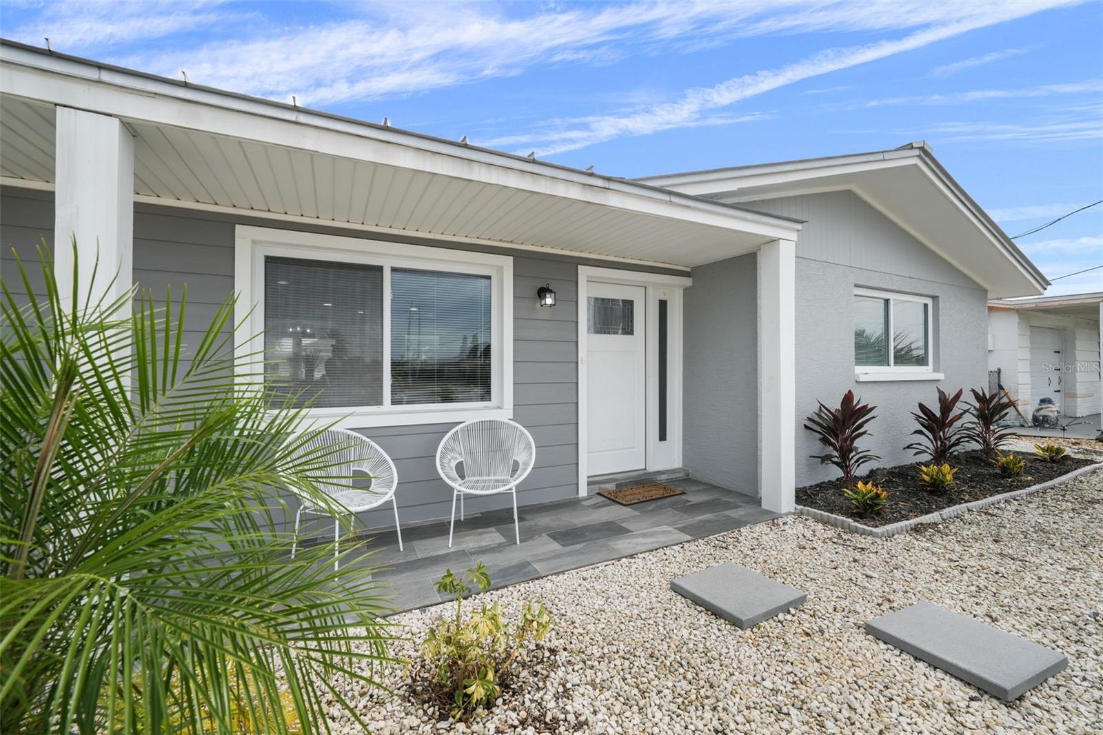 Fall in love with the vibrant Key West vibe and laid-back lifestyle of Hudson Beach in this fully remodeled 2-bedroom, 1.5-bath waterfront gem! From top to bottom, this home showcases fine finishes, designer tile work, and an open-concept layout that maximizes space and comfort. A flexible formal dining area offers stunning water views and could easily serve as a second family room, home office, or bonus space.
Enjoy the convenience of an indoor laundry room with a combo half-bath and built-in storage. The brand-new appliances (all under warranty!) and thoughtfully designed kitchen make everyday living a breeze.
Step into your tropical backyard retreat, complete with low-maintenance faux turf, a stylish cabana with a built-in bar, and space for an outdoor kitchen—ideal for entertaining or relaxing by the canal. Kayak racks are ready to go, and there’s plenty of room for all your water toys. A deep-water canal just steps from your door gives you quick, direct Gulf access in only 4 minutes—perfect for boating, fishing, or chasing tarpon and mackerel in the shallows. The double-wide driveway and extra parking mean there’s space for your boat trailer, golf cart, or guests. Inside the garage, you'll find a new hot water heater and ample storage solutions. Located in a golf cart–friendly community with a local beach, marina, community center, and regular golf cart parades, Hudson Beach offers an unbeatable small-town coastal experience. Enjoy waterfront dining, live music, and the #1-rated ice cream shop—all just around the corner. Whether you’re looking for a vacation getaway, a primary residence, or a high-performing investment property, this hidden gem is your ticket to Florida’s Gulf Coast paradise. ALL Appliances still under warranty, New Flooring, New Cabinets, WI FI Garage Door, New Vanities, and more.... Club Car Golf Cart can be included with sale for agreed upon Sale Price.