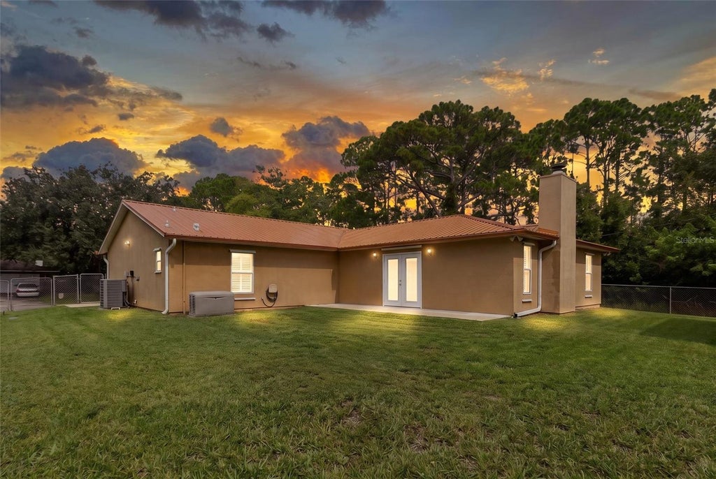 Photo of 491 Carpenter Avenue NW, Palm Bay, FL 32907 (MLS # O6438585)