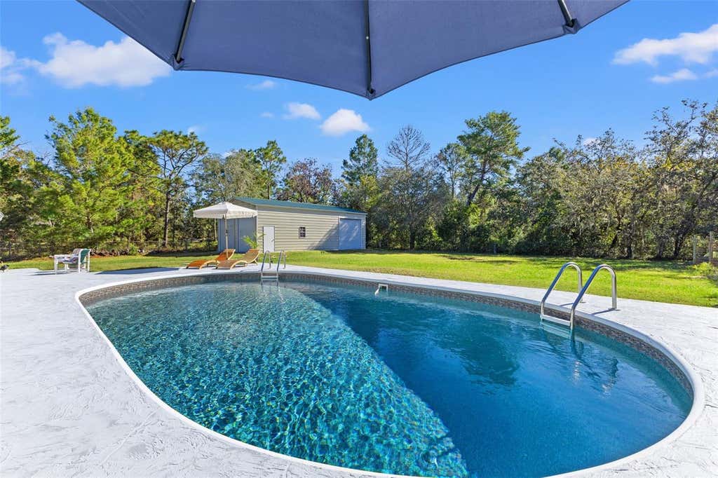 Photo of 17504 Thomas Boulevard, Hudson, FL 34667 (MLS # TB8537357)