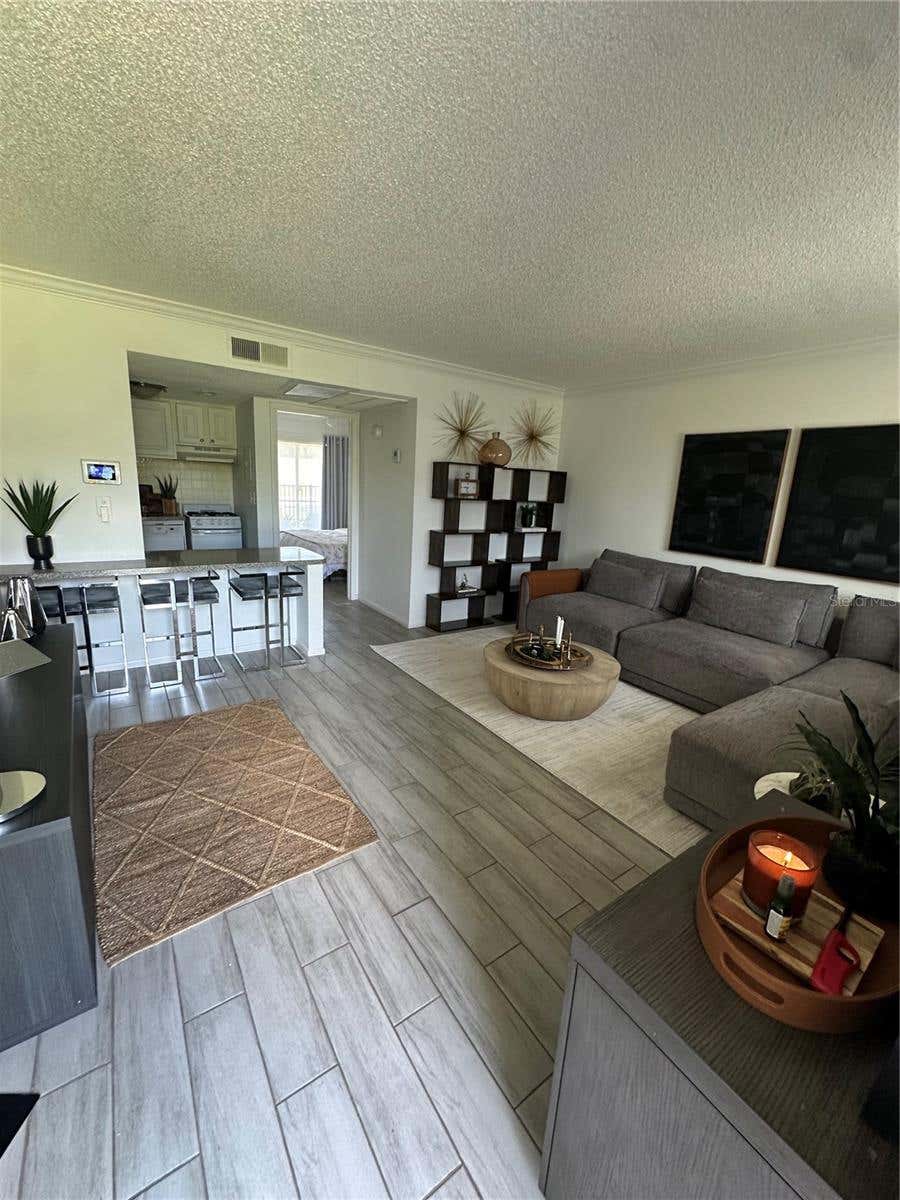 Photo of 115 Oyster Bay Circle #170, Altamonte Springs, FL 32701 (MLS # O6419128)