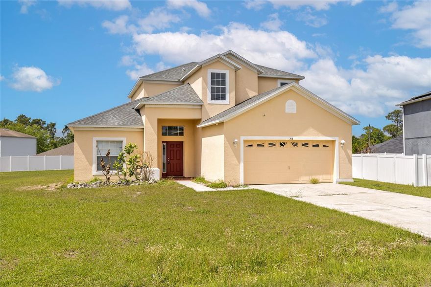 This spacious two-story home features the kind of layout, lot size, and location that makes it easy to see the long-term potential. Situated on an oversized lot in Poinciana, this property is ideal for a buyer who wants space, strong fundamentals, and the chance to update and personalize a home to match their own style and vision. From the moment you step inside, you can feel the scale of the main living area, where soaring ceilings and large windows bring in natural light and create an open, airy first impression.

The entry leads into a generous living space with a layout that flows naturally into the dining area and kitchen, giving the home a functional setup for everyday living and future entertaining. The kitchen features a practical footprint with ample cabinet space, a breakfast bar, and direct connection to the main gathering areas, making it easy to imagine the impact thoughtful updates could have here. The large sliding glass doors at the rear of the home create a strong indoor-outdoor connection and open to a covered patio and a FENCED YARD with plenty of room to expand your outdoor lifestyle.

Throughout the home, you will find wood-look flooring in many of the main areas and bedrooms, adding continuity and warmth. The home does need TLC, updates, and renovations, but it provides a solid starting point for buyers who recognize the value of space and are ready to make it their own over time. The bedrooms are well-sized and provide flexibility for guests, home office use, or growing household needs. The primary suite is spacious and includes a large en-suite bathroom with dual sinks, a soaking tub, separate shower, and walk-in closet. Secondary bathrooms and living spaces feature good square footage and a layout that supports both comfort and function.

Upstairs, the home continues to feel open and versatile, with additional bedroom space and a layout that gives separation from the main living areas below. The laundry room is separately positioned for convenience, and the attached garage adds useful storage and utility space. Outside, the backyard is one of the most appealing features of the property. Fully fenced and generously sized, it provides room to create the outdoor setting you have in mind, whether that means adding entertaining space, play space, landscaping, or future improvements.

Located in the growing Poinciana area of Central Florida, this home places you within reach of everyday shopping, dining, schools, parks, and commuter routes connecting to Kissimmee, Davenport, and the greater Orlando area. Buyers seeking a property with upside, space to improve, and long-term value will appreciate the convenience and accessibility of this location. You are also positioned within reach of major employment corridors, recreation, and the attractions that continue to support demand throughout the region.

This is not a fully updated home, and that is exactly where the potential begins. For the right buyer, this property presents the chance to step into a spacious home, make meaningful improvements, and shape a space that truly reflects their lifestyle. Schedule your private showing to see the possibilities for yourself.