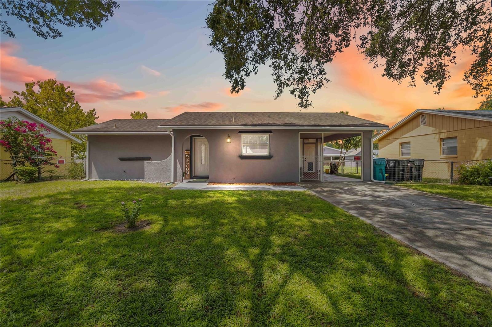 One or more photo(s) has been virtually staged. This 2-bedroom, 1-bathroom home in Orlando offers 854 square feet of comfortable, move-in-ready living. Ideal as a starter home or investment property, the interior features tile flooring throughout, fresh paint, an updated bathroom, and all-new stainless steel appliances in the kitchen. The home opens to a spacious fenced backyard, perfect for outdoor entertaining, gardening, or simply enjoying some private outdoor space. Its layout maximizes functionality and ease of living while keeping maintenance simple. Location is a standout feature, with quick access to downtown Orlando, Costco, shopping centers, dining options, and major attractions including Universal Studios. Commuting and everyday errands are convenient thanks to nearby roads and transportation options. With recent updates, a practical layout, and a central location, this property is an appealing opportunity for first-time buyers or investors looking to enter the Orlando market. It combines ready-to-enjoy interiors with a versatile outdoor space, all within reach of the city’s amenities and entertainment options. Mortgage savings may be available for buyers of this listing.
