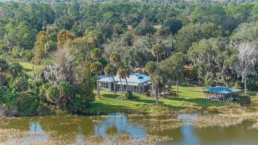 Exceptional opportunity featuring over 700 linear feet of lakefront in a rare Old Florida natural setting.
Privately owned by the same family for four generations, this remarkable 18.75-acre lakefront property offers endless possibilities for use, investment, or development. Originally settled in the late 1890s, this historic Haines City property represents a truly unique offering with deep local roots.

The property may be enjoyed as a private lakefront estate, continued in its historic use as a revenue-generating fish camp alongside a lakefront estate home, or repositioned as a prime development opportunity in one of Polk County’s fastest-growing cities.

An existing residence on the property has withstood multiple hurricanes and features poured concrete walls, a fortified brick exterior, and a metal roof installed in 2010. The home is well-suited for use as a guest house or interim residence while constructing a new lakefront estate.

This offering includes a business opportunity with multifamily-zoned parcels (Zoning Code 0803 – SFR & MH)