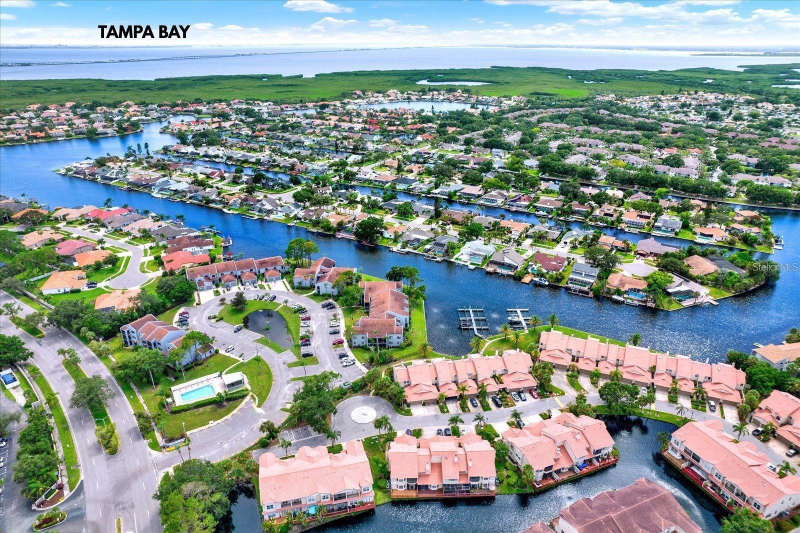 Welcome to Paradise at Colony Bay a gated community and WATERFRONT Condo with a BOAT SLIP !!!! This gorgeous three-bedroom and two-bathroom condo has spectacular upgrades with Custom designer white beveled Cabinets which are all soft close and plenty of storage, granite countertops, tile backsplash, Samsung stainless steel appliances, full size washer/dryer, dry bar with wine fridge ,tankless water heater, water softener, electric remote blinds, all fixtures, recessed and pendant lighting with dimmers, all Delta bathroom finishes & accessories, texture & painting and Luxury waterproof vinyl plank floors throughout, with high ceilings, crown molding. The living area has a covered screened - in balcony that overlooks the community, and the master bedroom is separate from the other bedrooms and is massive with a private covered screened - in balcony overlooking water and landscaping, with big walk-in closet, and En Suite Bathroom dual sinks with custom stand up shower. The other bedrooms are on the other side of condo and 2nd bathroom has custom stand up shower. Freshwater boat slip (can fit up to 26 ft) with boat lock and gives you access to everything. Rent includes water & sewer, trash, boat slip and 1 assigned parking spot and visitor parking. Colony Bay is the best kept secret in town with a swimming pool, tennis & basketball courts, pet park and playground. You can also join the Bay Port Yacht Club to enjoy monthly social events or boating outings. Convenient location to beaches, restaurants. Golf course, three major malls, Tampa International Airport, and easy access to major expressways. This is Florida Living at its best! This location is great for anyone looking to enjoy waterfront living while still being close to all that Tampa Bay has to offer
