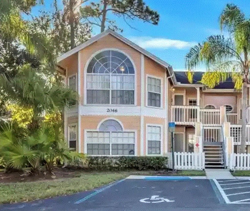 Photo of 2046 Royal Bay Boulevard #10, Kissimmee, FL 34746 (MLS # O6363883)