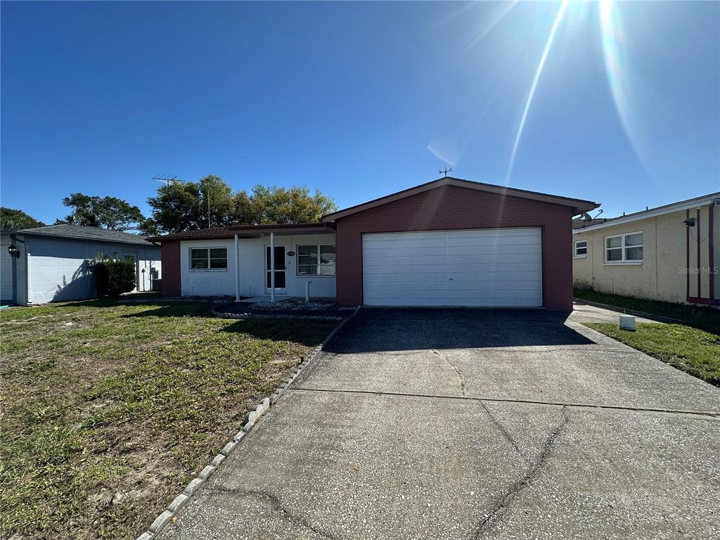 Photo of 9308 Wolcott Lane, Port Richey, FL 34668 (MLS # W7884100)