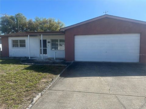 Photo of 9308 Wolcott Lane, Port Richey, FL 34668 (MLS # W7884100)