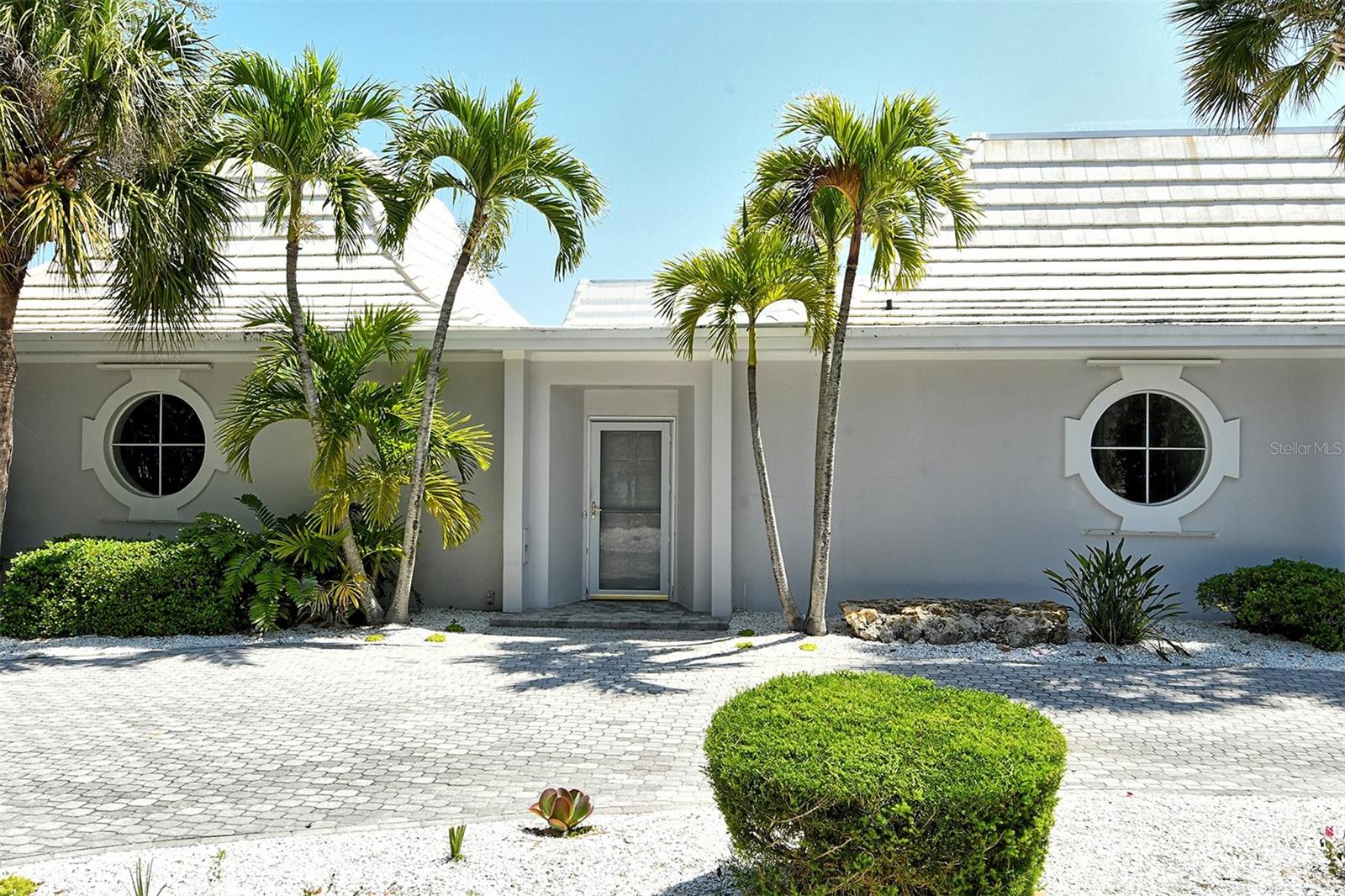 Exclusive Casey Key Waterfront Rental | 3,000+ Sq Ft | Beach & Bay Access
Welcome to this rare rental opportunity on the prestigious barrier island of Casey Key. This spacious, over 3,000 sq ft, unfurnished home offers private beach and bay access, surrounded by lush tropical foliage and tranquil water views.
Inside, you'll find light-filled open living spaces with crisp white interiors, neutral tile and wood-style flooring, and walls of windows framing the natural beauty outside. The recently updated kitchen features clean white cabinetry, quartz countertops, stainless steel appliances, and a breakfast bar overlooking the patio and greenery.
The primary suite captures stunning views of the Intracoastal Waterway and provides direct access to outdoor living areas. Multiple sliders lead to an expansive paver patio—ideal for entertaining, dining al fresco, or soaking in the peaceful setting.
This serene coastal home is perfect for those seeking the luxury of waterfront living with the flexibility to make it their own. Long-term lease only. Embrace the quiet elegance and coastal lifestyle of Casey Key.