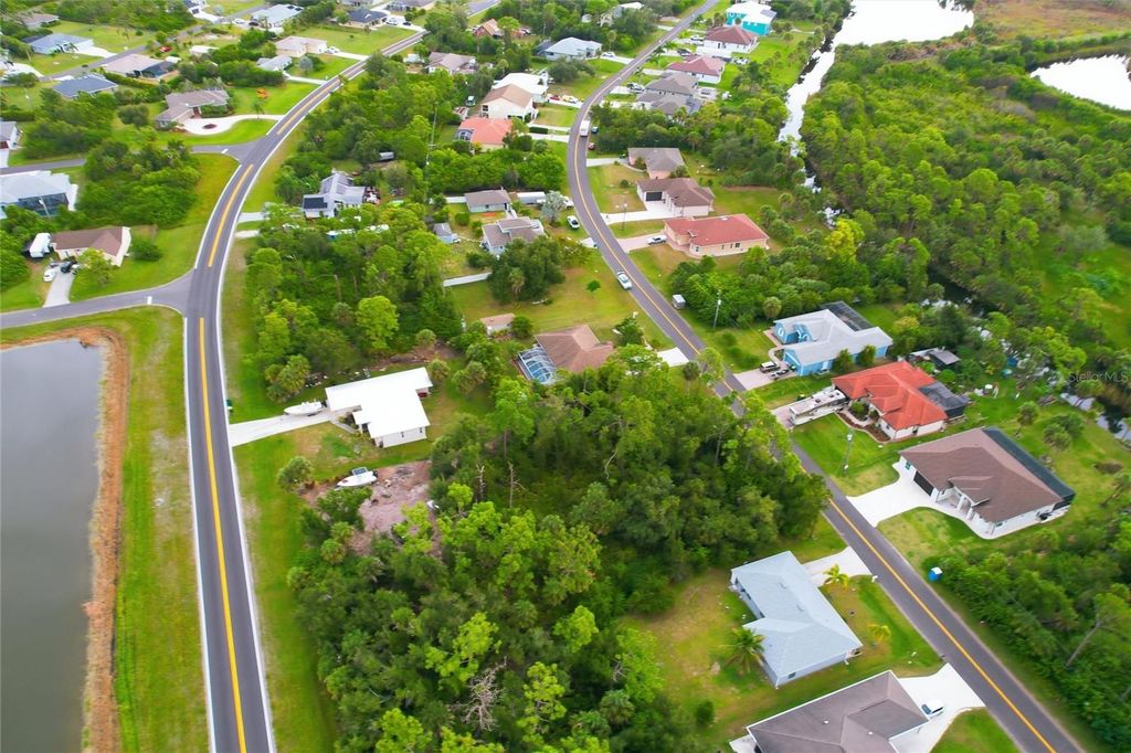 Photo of 6387 Mckinley Terrace, Englewood, FL 34224 (MLS # C7517085)