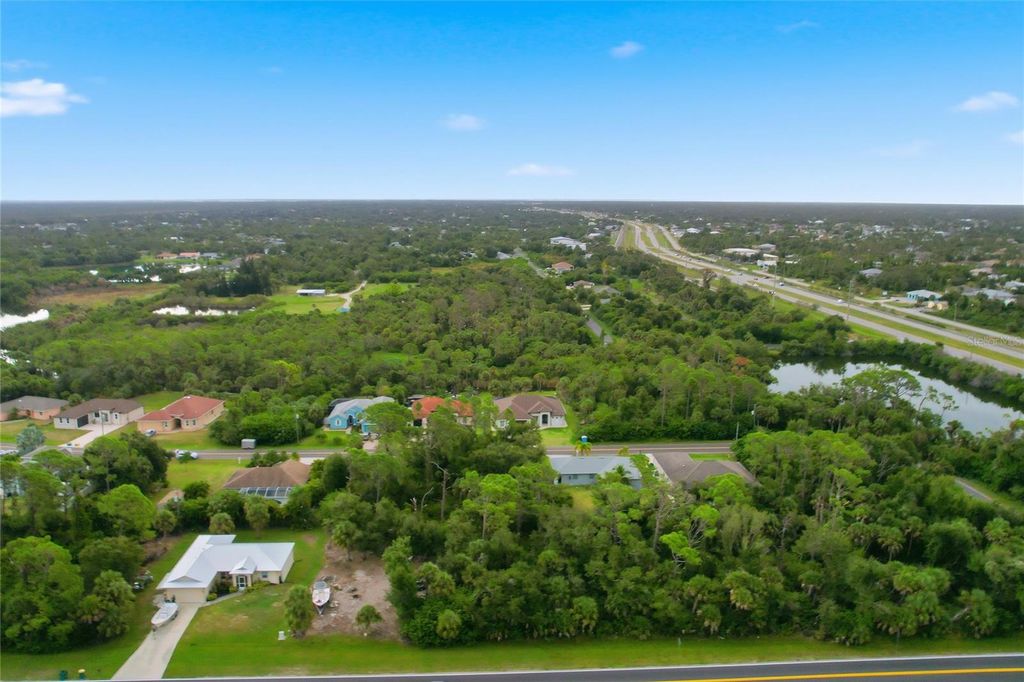 Photo of 6387 Mckinley Terrace, Englewood, FL 34224 (MLS # C7517085)