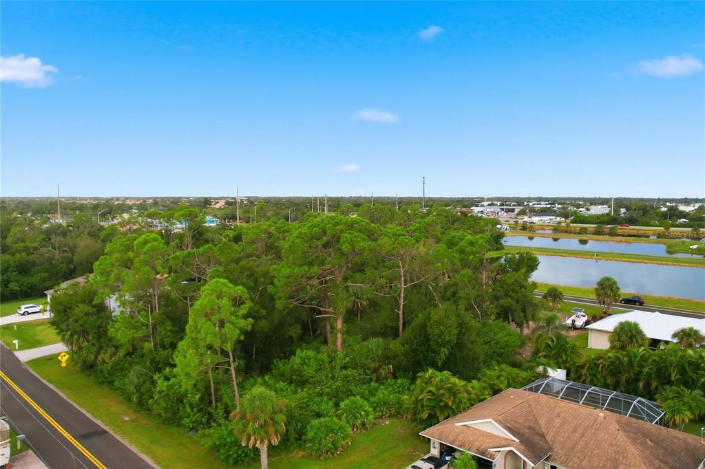 Photo of 6387 Mckinley Terrace, Englewood, FL 34224 (MLS # C7517085)