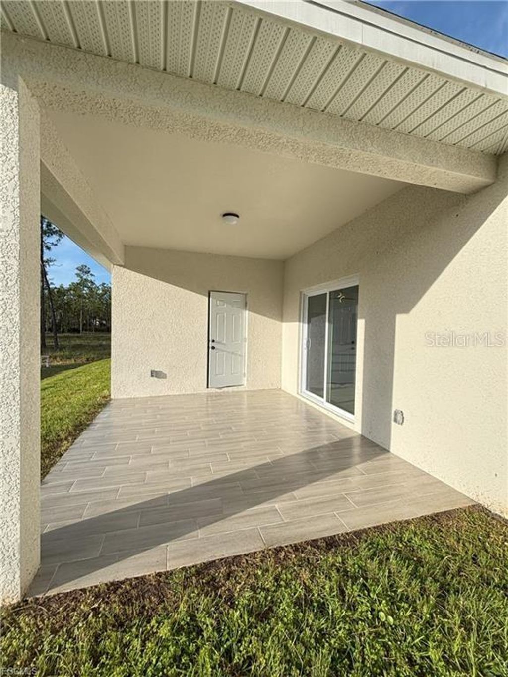 Photo of 1422 Highland Avenue, Lehigh Acres, FL 33972 (MLS # A4686392)