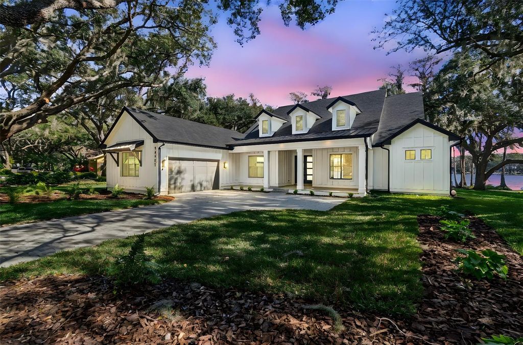 Photo of 14151 Wadsworth Drive, Odessa, FL 33556 (MLS # TB8463297)