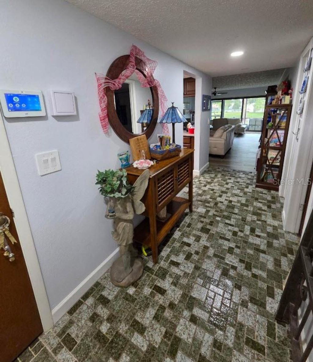 Photo of 7614 Radcliffe Circle #104B, Port Richey, FL 34668 (MLS # TB8461640)