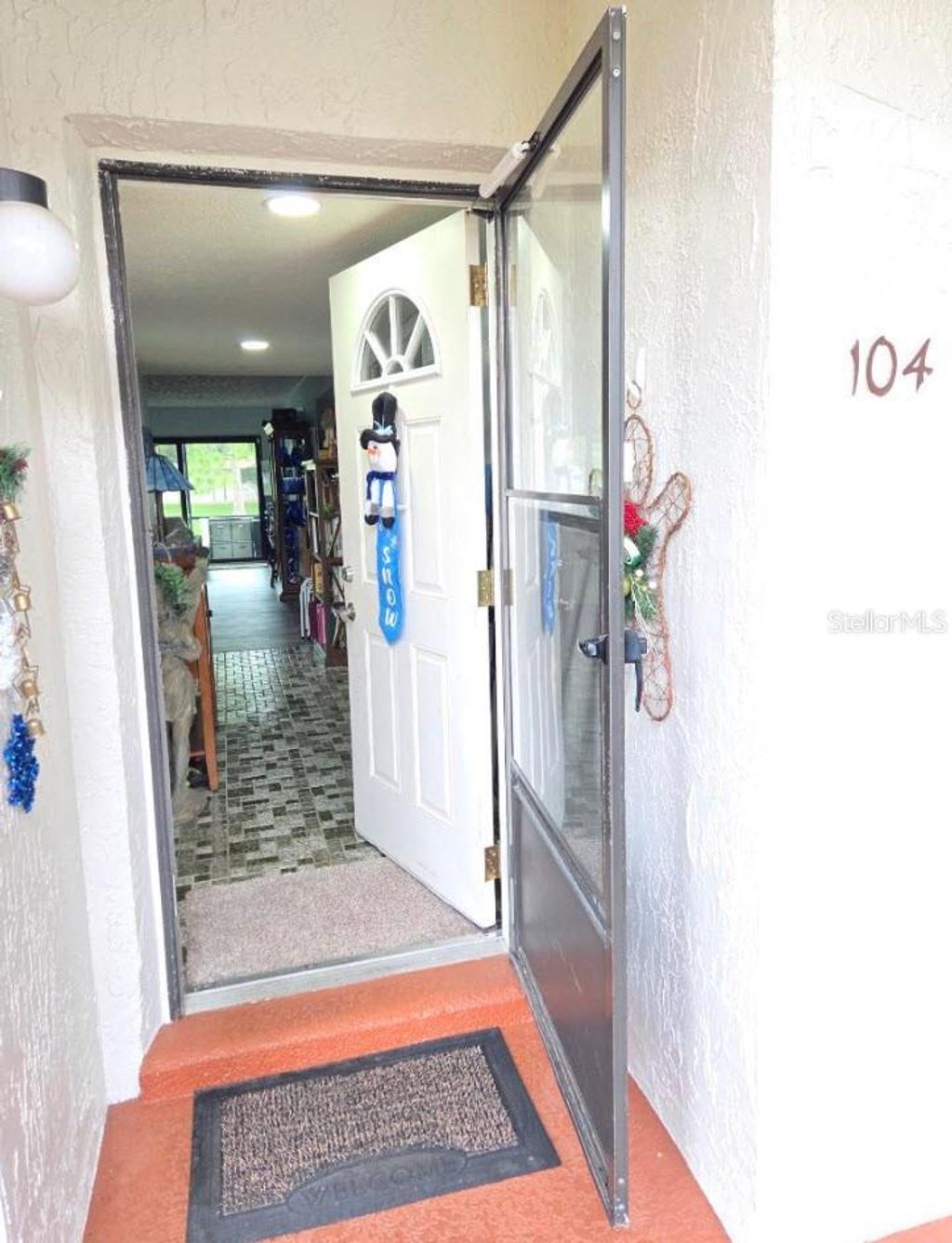 Photo of 7614 Radcliffe Circle #104B, Port Richey, FL 34668 (MLS # TB8461640)