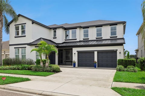 Photo of 433 Blue Cypress Drive, Groveland, FL 34736 (MLS # G5117233)