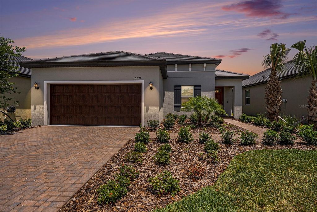 Photo of 10098 Banyan Breeze Boulevard, Land O Lakes, FL 34638 (MLS # TB8384264)