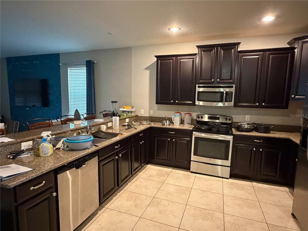 Photo of 1419 Wexford Way, Davenport, FL 33896 (MLS # O6436732)