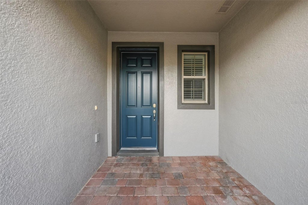 Photo of 1154 Water Iris Way, Orlando, FL 32828 (MLS # O6436680)
