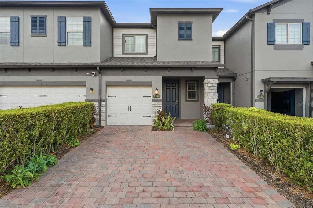 Photo of 1154 Water Iris Way, Orlando, FL 32828 (MLS # O6436680)