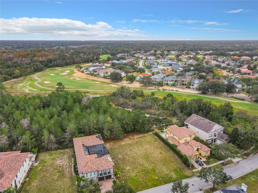 Rare opportunity: This double lot boasts a stunning conservation view and 110 feet of frontage, offering the perfect canvas for creating your dream property. Situated within the incredible Reunion community featuring three championship golf courses, a large water park, a gym, two club houses, restaurants, tennis courts, mini golf, pickleball, and sidewalks galore for walking in the gorgeous Florida Sun. This property is just minutes from Disney and all the surrounding attractions, and a mere 30 minutes from Orlando International Airport. Whether you seek a primary residence or an investment for a short-term vacation property, the options are endless. MUST BE SOLD WITH O6165823.