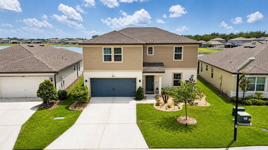 Welcome to North Park Isle, where space, comfort, and convenience come together in this beautifully designed two story home in the heart of Plant City. Offering 4 bedrooms, 3.5 bathrooms, and flexible living spaces, this home is thoughtfully designed for both everyday living and entertaining. Step inside to a generous foyer that opens into the spacious living, dining, and kitchen areas, creating a seamless open concept layout filled with natural light. The kitchen is equipped with stainless steel appliances, ample cabinetry, and a large center island with additional seating, making it the perfect gathering spot for family and guests.

Enjoy the privacy and convenience of the first floor primary suite featuring a walk in closet and an ensuite bathroom with double vanity sinks and a separate shower. The first floor also offers a laundry area, half bathroom, and versatile flex space ideal for a home office, den, study, or potential additional bedroom. Upstairs, you are greeted by a spacious bonus room along with 3 additional bedrooms, including one with its own private bathroom, plus another full bathroom to accommodate family and guests.

Sliding glass doors from the living area lead to the outdoor covered patio where you can relax and enjoy views of the backyard and peaceful pond area. Located in the sought after North Park Isle community, residents enjoy resort style amenities including a clubhouse, pool, playground, and more. Centrally located just minutes from I-4, this community offers easy access to the Greater Tampa Bay Area, Lakeland, and Orlando, making commuting and entertainment a breeze.