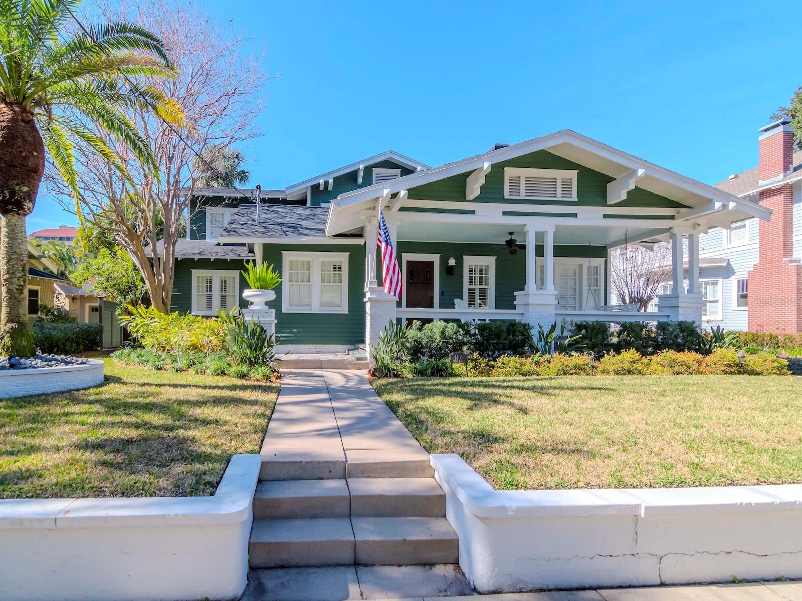 Step into timeless charm with this beautifully preserved Historic Hyde Park bungalow, just steps away from the vibrant Bayshore Boulevard. The main house features three spacious bedrooms and three and a half well-appointed baths, where classic architectural details meet modern comforts. Step inside from the spacious front entry porch and you are greeted by an expansive living room and bonus sunroom that features a double-sided fireplace. Continuing along, there is a large formal dining room and a dedicated office space, both with built-in cabinetry offering plenty of storage. The gourmet kitchen is fully updated and includes an island cooking/seating area. Appliances are top-of the-line with two, built in ovens, gas cooktop, designer refrigerator, and a beverage refrigerator. Not only is there plenty of cabinetry, just across the kitchen is an additional built-in pantry offering counter space as well as cabinetry for storage. Adjacent to the kitchen, the family room overlooks the brick patio and pool area complete with spa and a large seating area covered by a pergola. Three French doors allow ample natural sunlight to pour into the family room throughout the day. Just off the family room is a dedicated media room with six luxury seats and 120” screen for enjoying the big game or movie night. The three main bedrooms are located just up the stairs as well as the laundry area highlighted by a newer washer and dryer. The primary bedroom features a spacious walk-in closet with built-ins and a spa-like bathroom with shower and soaking tub. The second bedroom is expansive and includes an ensuite bath and walk in closet with built-in cabinetry and storage. To round out the upstairs, the third bedroom, located just next to the third bathroom, offers plenty of space and an additional walk-in closet, complete with built-ins. The detached two car garage sits at the end of the driveway and has been reinforced with a new steel beam to add extra support and includes a newer garage door. An additional, private, one-bedroom, one-bath suite above the garage offers versatile space—perfect for guests, an additional home office, or an in-law retreat. The home has benefitted from various updates throughout the years including a full interior renovation (including electrical and plumbing) and structural renovation in 2007. Roof was replaced in 2021; A/C’s in 2022 and 2023. (A full list of updates and renovations is attached to listing). This home is located within steps Bayshore Boulevard; minutes to the SoHo restaurants and night-life locations; Downtown Tampa; Channelside District; Ybor City; I-275; Crosstown Expressway and more. Enjoy the blend of historic allure and contemporary living in Historic Hyde Park!