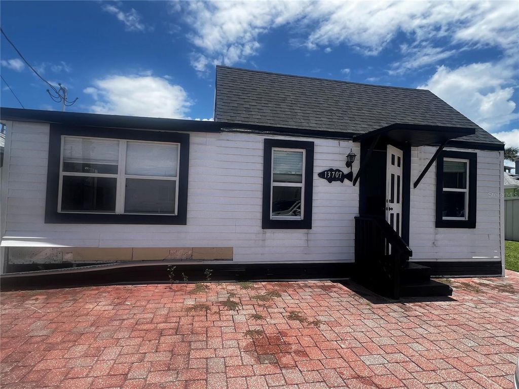 Photo of 13707 Plymouth Street, Madeira Beach, FL 33708 (MLS # TB8407102)