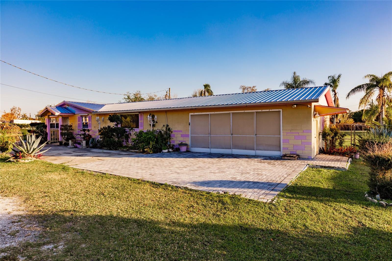 If you have been looking for a three bedroom, two bathroom, two car garage, concrete block home under $200,000, YOUR SEARCH STOPS HERE! Come take a peek at this lovely home! Interior features include bright living spaces seamlessly connected with a convenient floor plan! The kitchen is spacious with plenty of room for meal prep! The dining room also doubles as a bonus room which would be amazing for a home gym area or home office! The exterior is just as grand! The property measures almost a third of an acre which makes it feel like you have so much outdoor space to enjoy! The back yard is perfect for friendly gatherings, cook outs, or just for furry pets to run and play! Have toys or extra vehicles that need to be stored? There are a couple of outbuildings and a carport for convenient storage! Live the good life and enjoy easy access to local restaurants, schools and shopping! I-75 is just a quick 20-25 minute drive away for easy commuting! You really need to see this in order to truly realize all that this property offers! Contact your real estate agent to book a private tour!