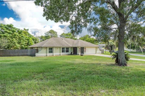 Photo of 1398 Exotic Avenue, Spring Hill, FL 34609 (MLS # TB8428436)