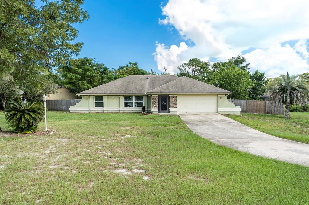 Photo of 1398 Exotic Avenue, Spring Hill, FL 34609 (MLS # TB8428436)