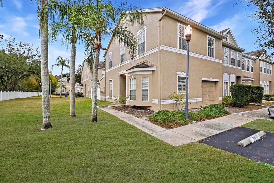 Welcome to this beautifully maintained 3-bedroom, 2.5-bathroom townhome located in the desirable Trafalgar Square community of Tampa!

As you step inside this two-story home, you’re greeted by cherry wood laminate flooring throughout the main living area, new interior paint, new ceiling fans, and large windows that fill the space with natural light. This home is concrete construction on both floors, providing additional peace of mind. The first floor offers a functional and inviting layout, featuring a convenient half bath, a well-appointed kitchen, and sliding glass doors that lead to your own private screened-in patio—perfect for relaxing or entertaining. The backyard is fully fenced, with a vinyl privacy fence,  providing additional privacy and a great outdoor retreat.

Upstairs, you’ll find the washer and dryer closet for added convenience, along with all three bedrooms. The spacious primary suite features an en suite bathroom with dual sinks and a walk-in shower. Two additional bedrooms share a full bathroom complete with a shower/tub combination. Upgrades include: new blinds on the sliding glass door, newer HVAC unit (2021), 5 inches of insulation installed, newer washer/dryer, and updated upstairs bathroom. 

This home offers low HOA fees while still enjoying fantastic community amenities, including a pool and playground. Ideally located near State Road 597 for an easy commute and just minutes from a variety of restaurants, markets, hospitals, and schools. You’re also only a short drive from the historic charm and entertainment of Ybor City and the campus of the University of South Florida, along with many other popular Tampa attractions.

Comfort, convenience, and location—this townhome truly has it all!