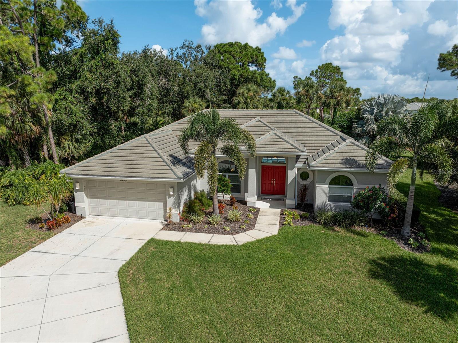 Nestled within the serene, winding streets of the sought-after Calusa Lakes community, and quietly tucked away on a private cul-de-sac in the maintenance-free enclave of Woodland Trails, lies the home of your dreams! From the moment you arrive, you'll be captivated by the striking curb appeal, framed by lush landscaping and tropical foliage. Inside, natural light pours through expansive sliding doors that span the rear wall, connecting the kitchen and living areas to the outdoors. The thoughtfully designed kitchen offers tranquil views of the secluded backyard—perfect for enjoying your morning coffee while soaking in Florida’s picturesque beauty. The open dining areas create an easy flow for entertaining family and friends. Meticulously maintained, this residence features three spacious bedrooms, two full bathrooms, and a charming office nook ideal for remote work. Peace of mind comes standard with a NEW ROOF (2020), NEW HVAC system (2018), HURRICANE SHUTTERS, and a fabric storm catcher on the lanai. The home has also been RE-PLUMBED, and the neutral paint color choices create a soothing a relaxing backdrop. Step outside to your newly screened lanai with a private resurfaced pool for a refreshing dip, or enjoy the nearby heated, community pool just a short stroll away. Golf membership is NOT mandatory, there is NO CDD fee and tennis courts are just waiting for you! Located just ten minutes from the sandy shores of Nokomis Beach, or the charming boutiques and eateries of Venice Island, coupled with numerous cultural venues provides plenty of entertainment or relaxation options. A private residents-only gate ensures swift access to the new Sarasota Memorial Hospital, and major highways for easy travel north or south. Be sure to view the 3-D and Aerial Tours to get a better look at your new Florida lifestyle!