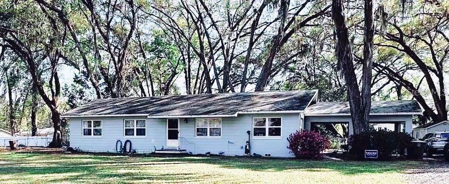 Beautifully updated 4-bedroom, 2-bath home in desirable NE Ocala! Located in a quiet, tucked-away neighborhood close to restaurants, shopping, downtown Ocala, and everyday conveniences, this home offers the perfect blend of charm, updates, and location.

The interior and exterior have been freshly painted, and the home features refinished original hardwood flooring throughout most of the living areas, with new waterproof laminate flooring in the kitchen and fourth bedroom. The kitchen has been tastefully refreshed with new real wood cabinetry, a large pantry, quartz countertops, stainless steel undermount sink,and mosaic tile backsplash.

Major updates include a new roof (2025), windows, plumbing and electrical.  The primary bathroom has been beautifully updated with new shower and floor tile, vanity, mirror, and glass doors. The hall bath also features updated countertop, floor tile, and mirror.

The fourth bedroom offers flexibility and could make a great home office, guest room, or private workspace with its own side entry. Inside laundry with washer and dryer.  Outside, enjoy a side entry carport, large fenced backyard and a 10x16 shed.

Conveniently located while still offering a peaceful neighborhood feel, this home is truly a must-see!