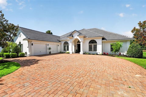 Photo of 9616 San Fernando Court, Howey In The Hills, FL 34737 (MLS # G5115579)