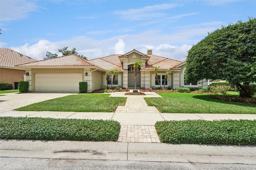Under contract-accepting backup offers. One or more photo(s) has been virtually staged. Located within the highly desirable Heathrow community and perfectly positioned on Hole #7 of the golf course, this exceptional 4-bedroom, 3-bathroom pool home offers luxury living in one of Central Florida’s premier gated neighborhoods. A pavered brick driveway and walkway welcome you to the home, leading to impressive double front entry doors. Inside, you’ll find a dedicated office, formal dining room, spacious living areas, LED lighting throughout, brand-new interior paint, updated light fixtures, and a thoughtfully designed floor plan ideal for both everyday living and entertaining. Major recent improvements include a brand-new main A/C system, new water heater, water softener, and double-pane windows throughout. The completely remodeled 2024 kitchen is beautifully appointed with quartz countertops, custom cabinetry, tiled backsplash with under-cabinet lighting, a large center island with eat-in seating, additional breakfast space, coffee bar, wet bar, pantry, and GE Café stainless steel appliances including an induction cooktop, double ovens, microwave, dishwasher, refrigerator, and advantium oven. The oversized laundry room offers exceptional functionality with built-in upper and lower cabinetry, a large utility sink, storage closet, and new LG washer and dryer set. The private primary suite features direct lanai access through elegant doors and a beautifully updated bathroom with dual vanities, a freestanding soaking tub, oversized walk-in shower, and an expansive custom walk-in closet with built-in organization.  Step outside to your private screened pool and spa retreat featuring a brand-new pool screen, spa, gas availability for grilling, full pool bath access with shower, and peaceful golf course and water views that create the perfect backdrop for relaxing or entertaining guests. The air-conditioned oversized three-car garage includes a convenient side-entry golf cart door along with an included garage refrigerator/freezer, adding both comfort and practicality. Residents of Heathrow enjoy 24/7 guarded gate access along with an abundance of community amenities including parks, playgrounds, basketball courts, soccer fields, and scenic walking trails. Optional membership to Heathrow Country Club provides access to championship golf, tennis, fitness facilities, and a resort-style pool. Conveniently located near I-4, SR-417, top-rated Seminole County schools, shopping, dining, and entertainment.