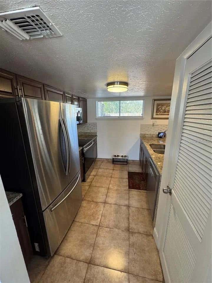 Photo of 1836 Warringwood Drive #B4, Orlando, FL 32839 (MLS # L4963081)