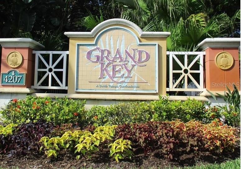 Welcome to your private retreat in the highly desirable Grand Key gated community. This immaculately maintained 2-bedroom, 2-bath condo is a top-floor corner unit, flooded with natural light and thoughtfully upgraded for comfort and style. The smart split-bedroom layout ensures privacy, while modern finishes make this home truly move-in ready. These are some of the highlights:
• Elegant bamboo flooring throughout
• New A/C (2023) for energy-efficient comfort
• Bright, open living/dining space with ceiling fans
• Screened-in balcony with an outdoor storage closet — perfect for morning coffee or evening unwind
• Energy-efficient stainless steel appliances
• Brand new dishwasher (2024) and large pantry
• Full-sized washer and dryer
• Owner’s suite features a luxurious walk-in marble shower linen closet & walk-in closet
• Second bath updated with new tub, tile flooring, and modern finishes
• Both bathrooms include chair-height toilets and contemporary tile upgrades