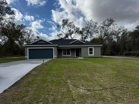 Photo of 2186 W G Martinelli Blvd, Citrus Springs, FL 34434 (MLS # O6384317)